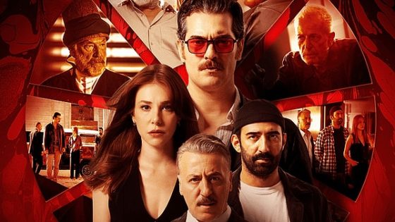 Ensemble movie poster with a red collage of tense characters; central figures include a woman with brown hair and a man with sunglasses, others in the background.